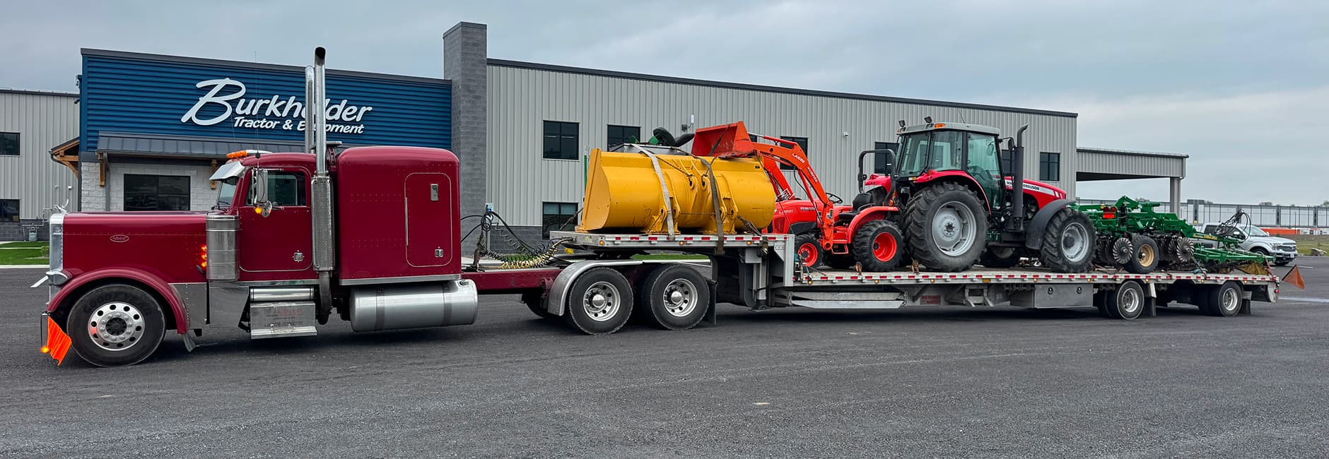 Red truck with ag equipment